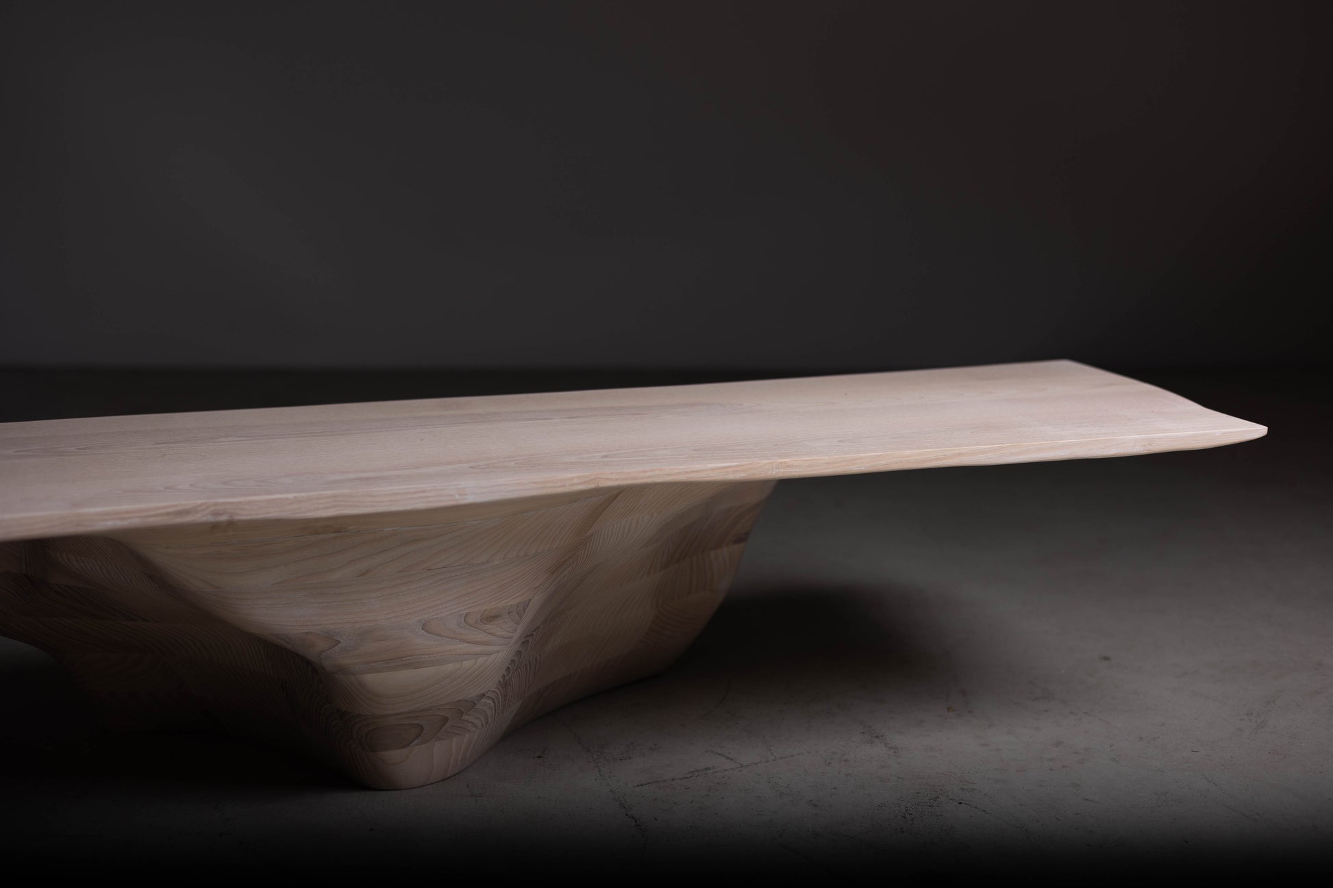 Sculptural Solid Wood Coffee Table EM111 Part Of Erosio Collection | Close-up image showing the fluid edge and sculptural details.