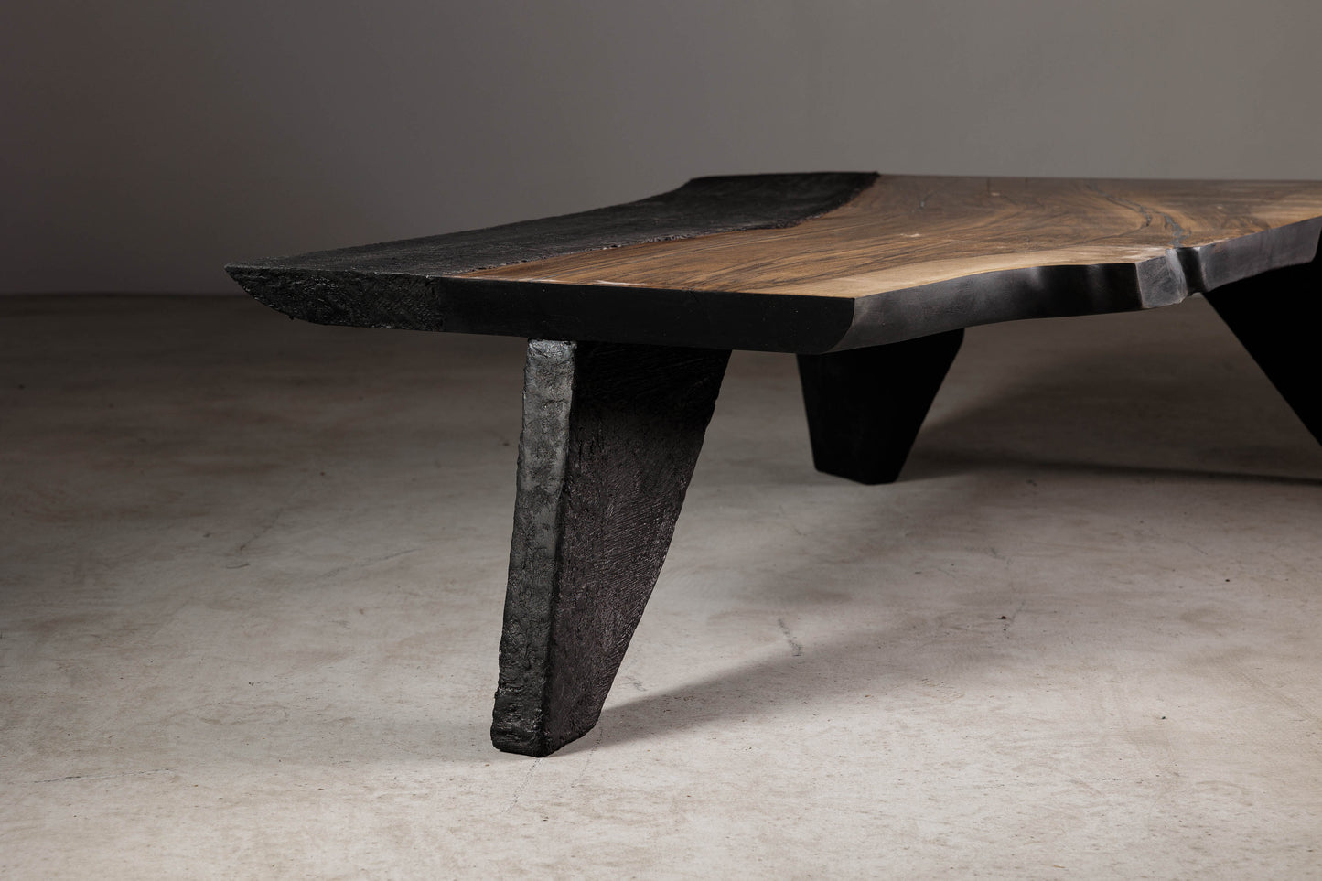 Brutalist Coffee Table With Japandi Influences EM106 Part Of 18Brut Collection | Perspective front view shot highlighting the geometry and blackened live edge. 