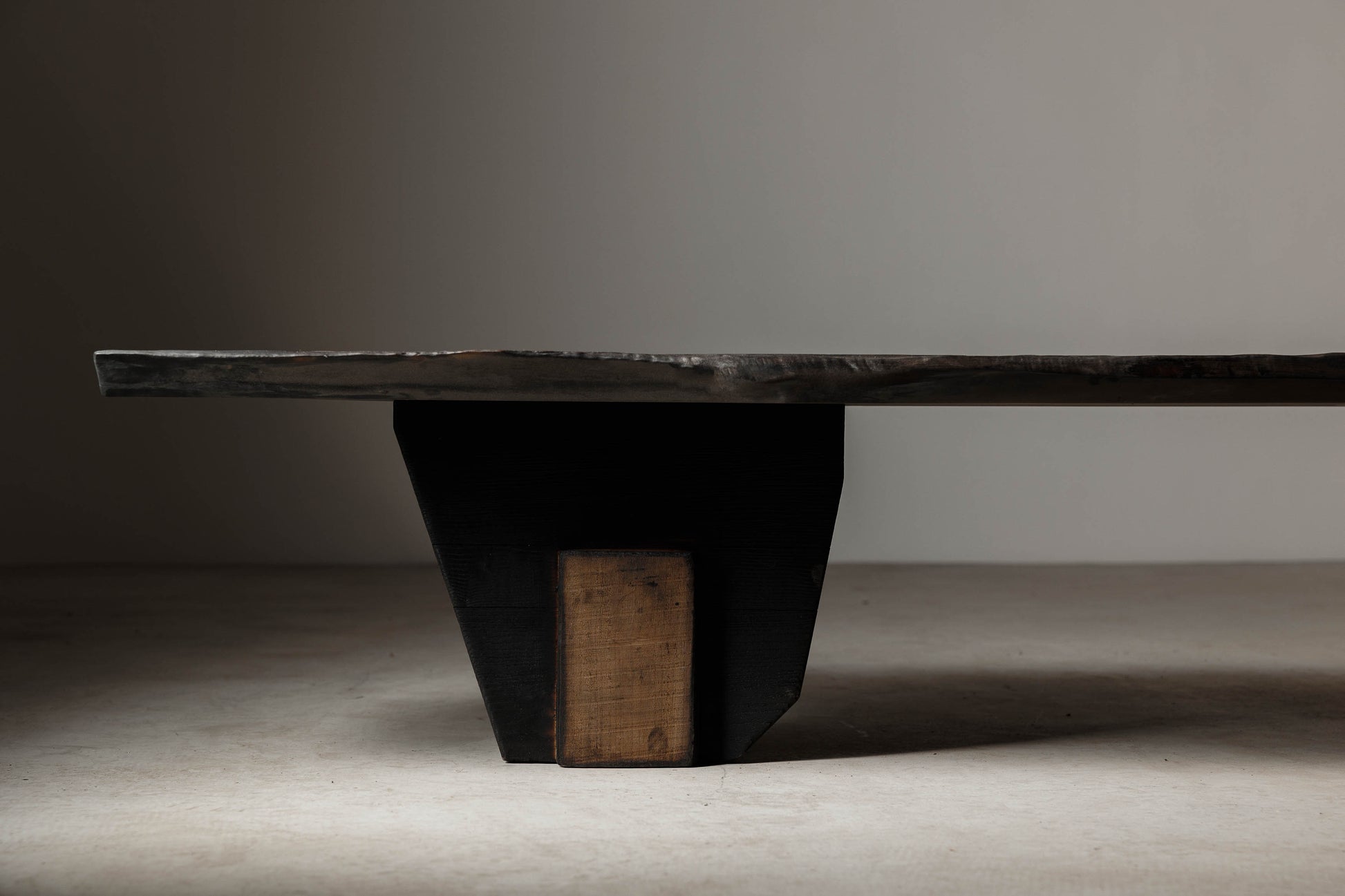 EM 107 Unique coffee table from the 18Brut collection | Sideview image showcasing the geometry and texture of this unique coffee table.