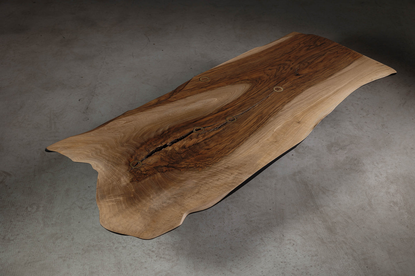 Modern Organic Walnut Coffee Table EM109 Part Of 18Brut Collection | Angled shot showing the shape of the walnut slab.