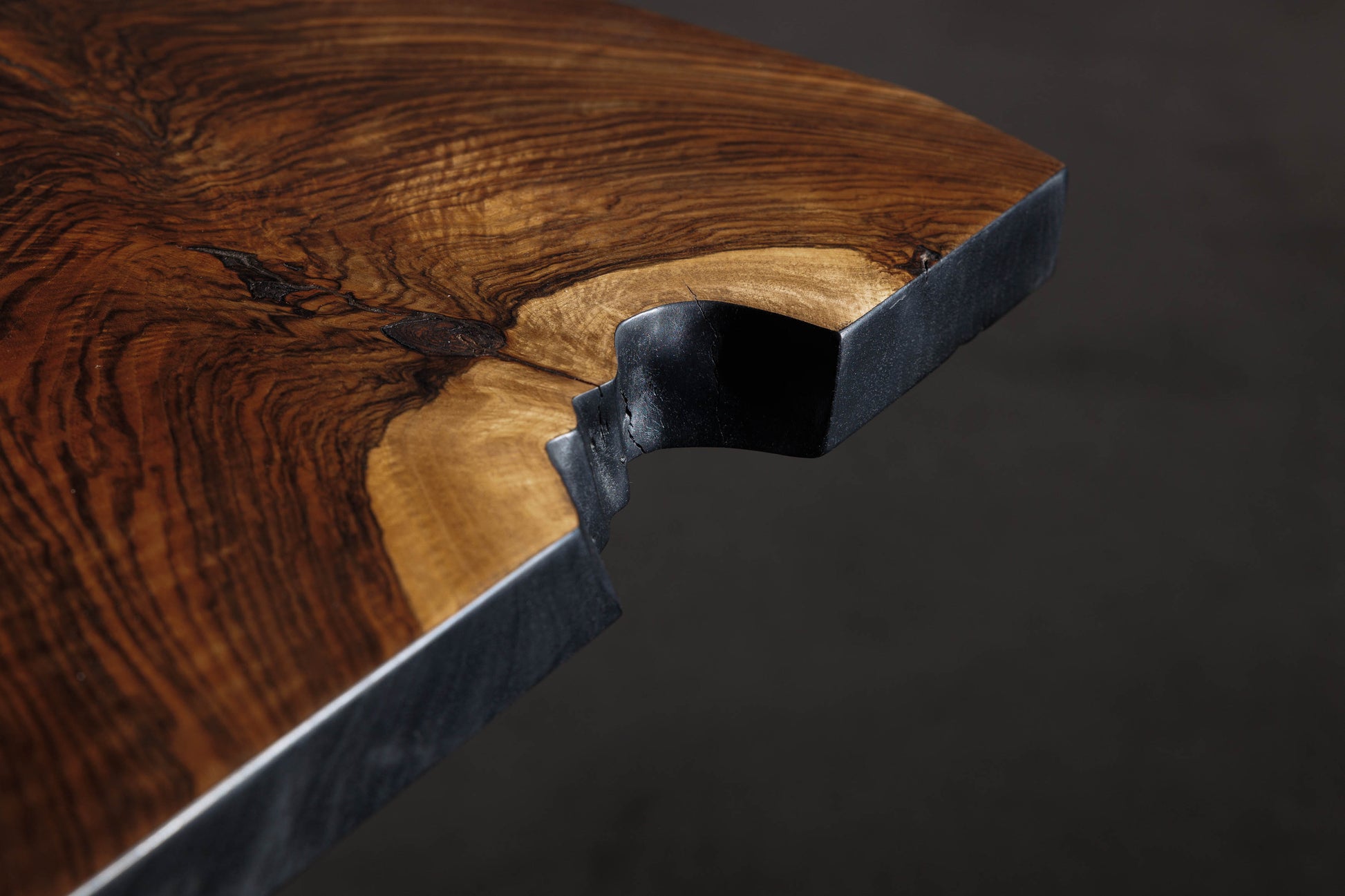 EM205 Of 18Brut Collection | Walnut Dining Table For 4 | Close-up image showing the live edge. 