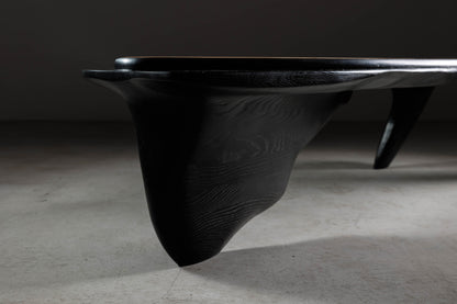 Sculptural Walnut Coffee Table EM110 Part Of Erosio Collection | Close-up image showing the front part of the sculptural base.